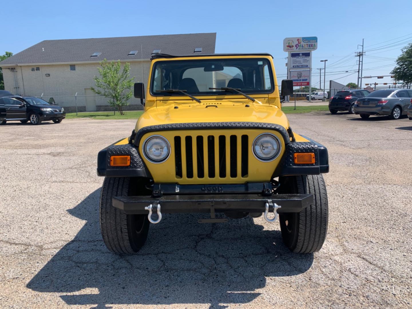 2001 Yellow /Black Jeep Wrangler WRANGLER (1J4FA49S81P) with an 6 Cylinders S 4.0L FI OHV 242 CID engine, AUTOMATIC transmission, located at 1830 North Belt Line Road, Irving, TX, 75061, (469) 524-0199, 32.834373, -96.993584 - Photo#1